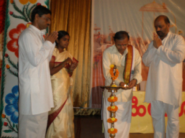 Inauguration of Dharmasbha by lighting an oil lamp by the dignataries